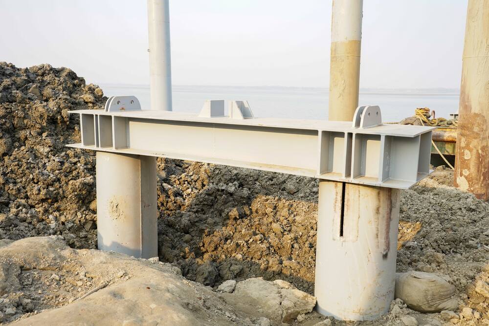 Steel platform beam installed on driven piles at a riverbank site